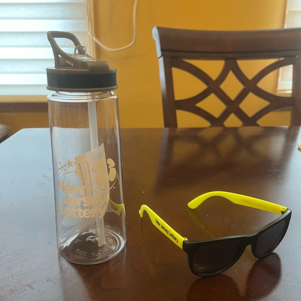New Jersey Lottery Promotional Items Clear Plastic Water Bottle and Sunglasses